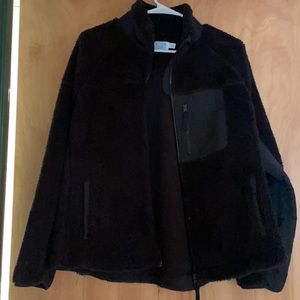 Woman’s large black jacket with zip pocket